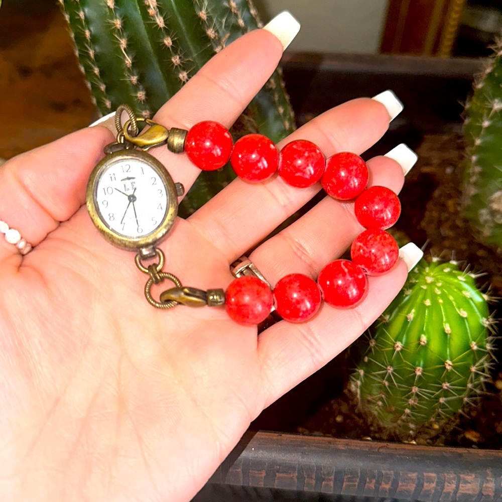 LE quartz crystal watch with semi precious stones stretchy red umbrella